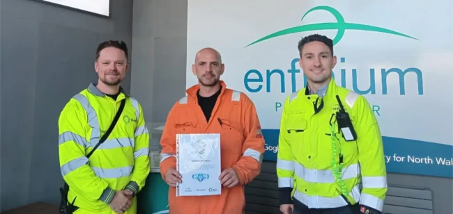 Parc Adfer outage award Photo showing employee Anthony Bannon receiving a certificate acknowledging his outstanding health and safety practices, personal leadership, vigilance and unwavering commitment throughout the outage programme